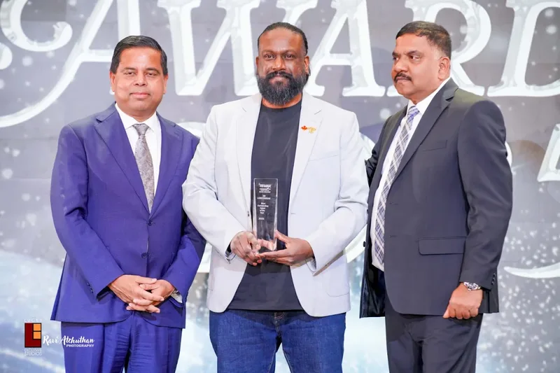 Sri Lankeswaran with Minister Gary at the RE/MAX Community Realty awards